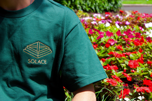 
                  
                    Load image into Gallery viewer, Embroidered Solace logo tee - Forest Green
                  
                