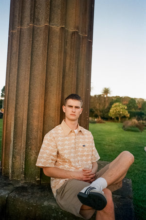 
                  
                    Load image into Gallery viewer, S Logo Button Up - Tan
                  
                